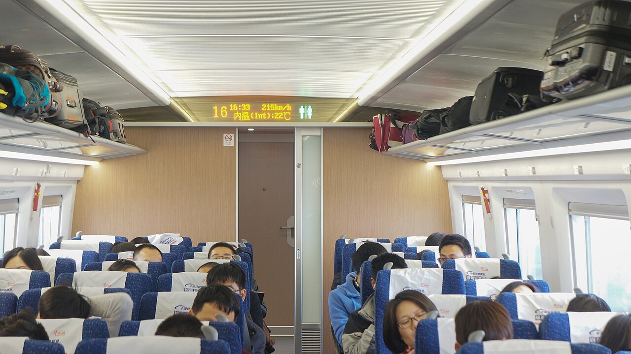 The 3+2 second-class cabin of a Chinese high-speed train — the carriage class most travellers book for Jiangxi's short hops