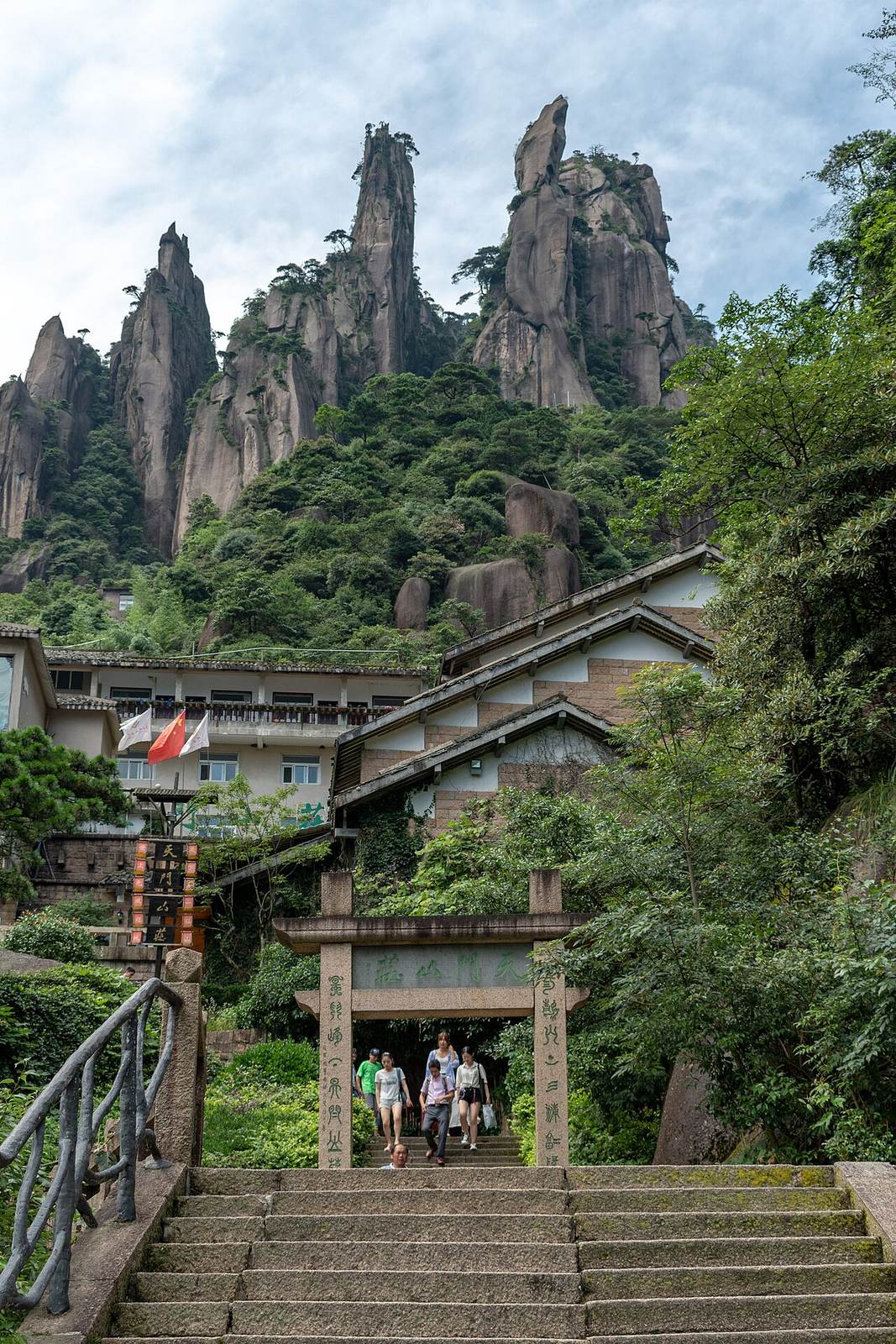 Granite peaks and pillars of Mount Sanqingshan rising above a sea of cloud, a UNESCO World Heritage natural site in northeast Jiangxi
